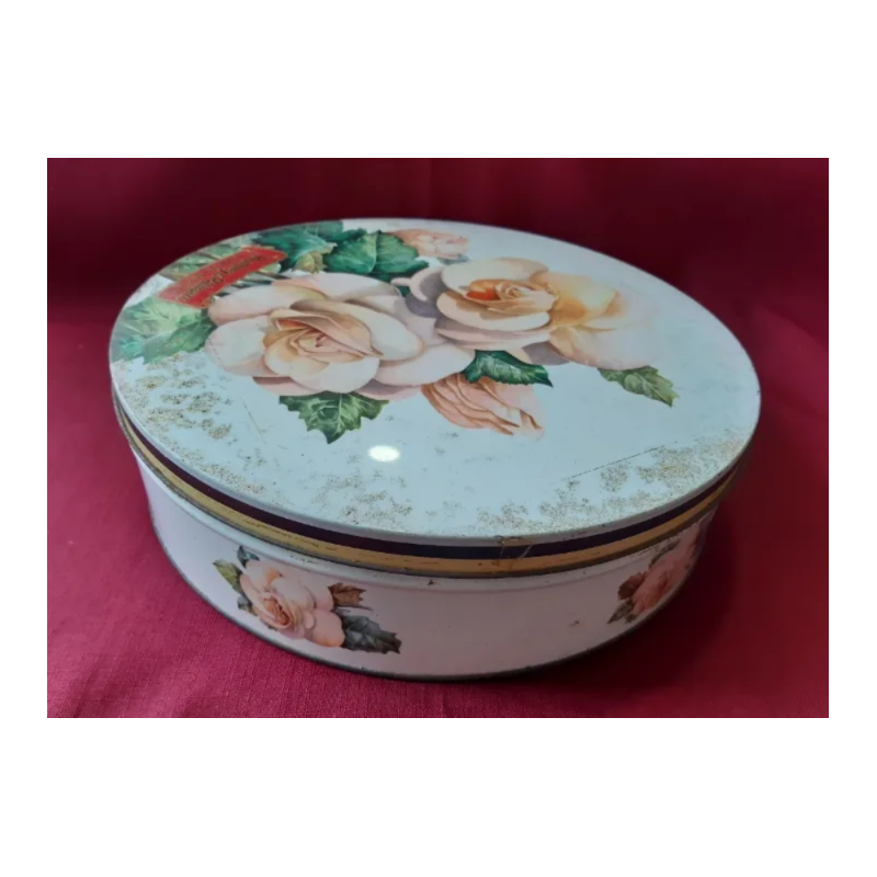 Antigua caja redonda metálica...