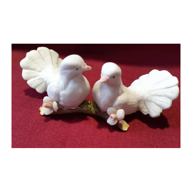 Biscuit. Pareja de pajaritos