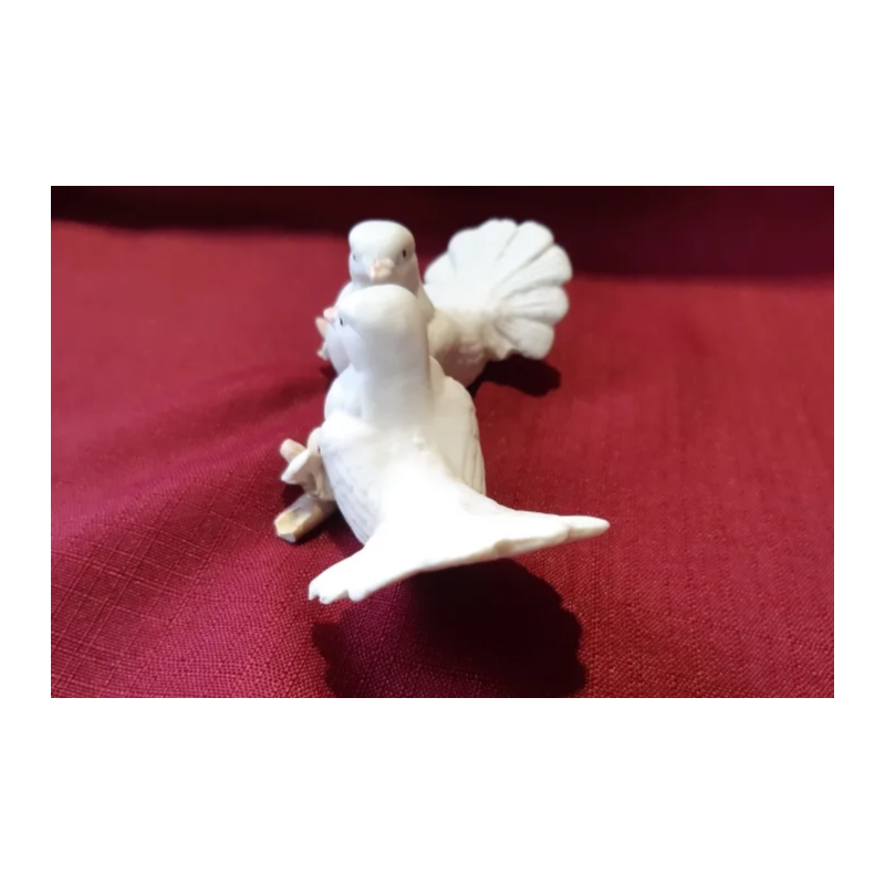 Biscuit. Pareja de pajaritos