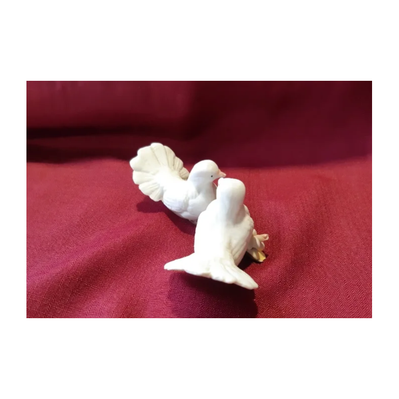 Biscuit. Pareja de pajaritos