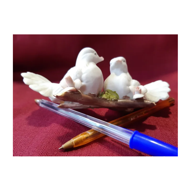 Biscuit. Pareja de pajaritos