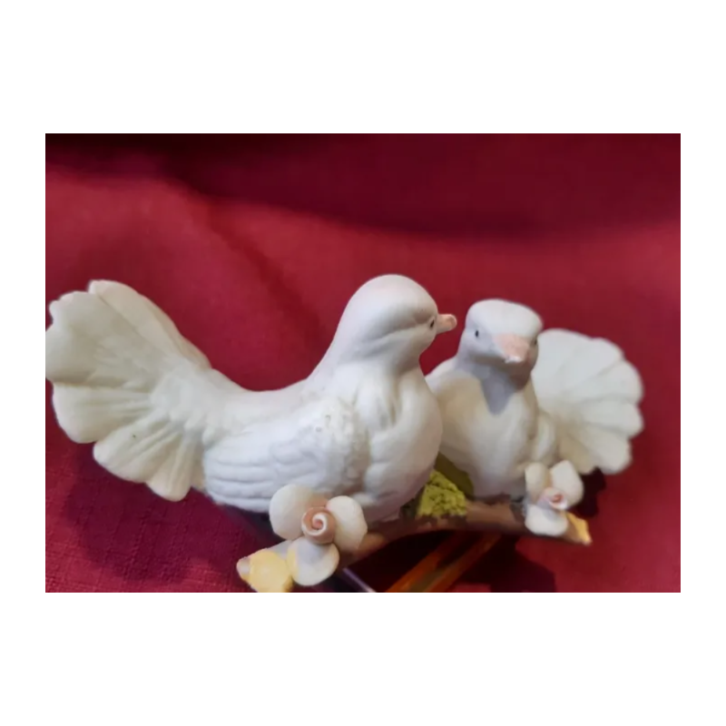 Biscuit. Pareja de pajaritos